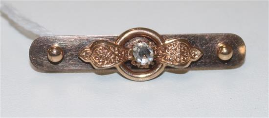 A diamond set bar brooch, 42mm